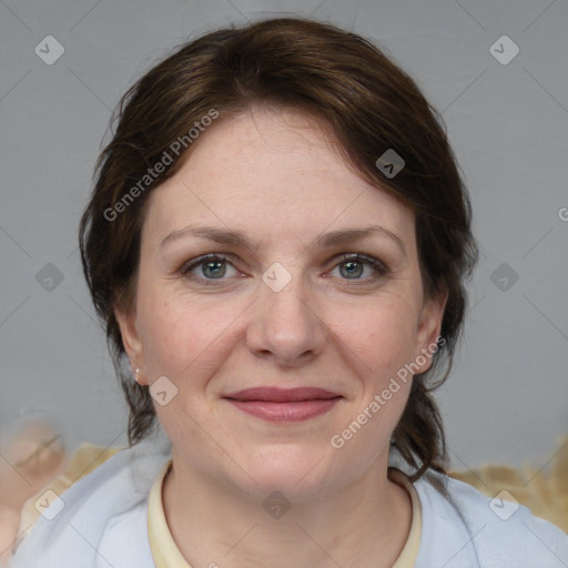 Joyful white young-adult female with medium  brown hair and blue eyes