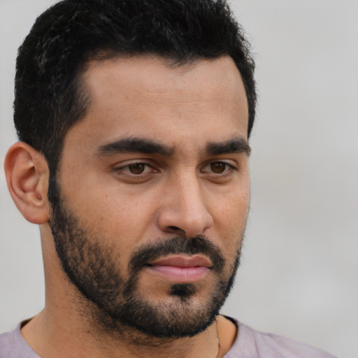 Neutral latino young-adult male with short  black hair and brown eyes