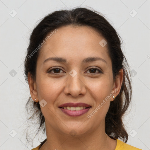 Joyful white adult female with medium  brown hair and brown eyes