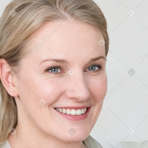 Joyful white young-adult female with medium  brown hair and blue eyes