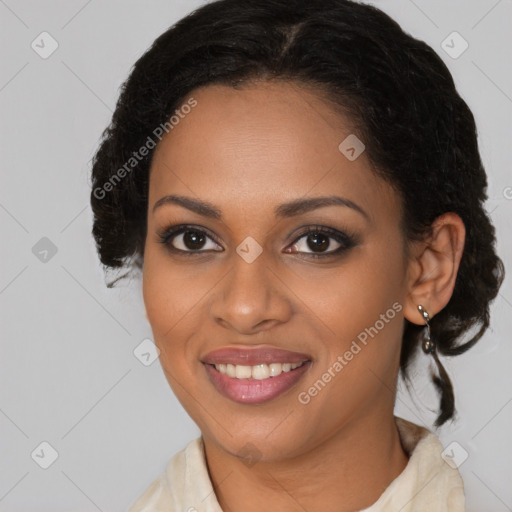 Joyful black young-adult female with medium  brown hair and brown eyes