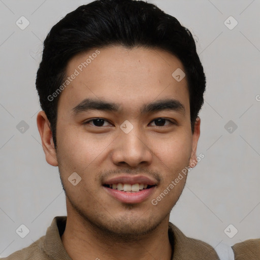 Joyful asian young-adult male with short  black hair and brown eyes