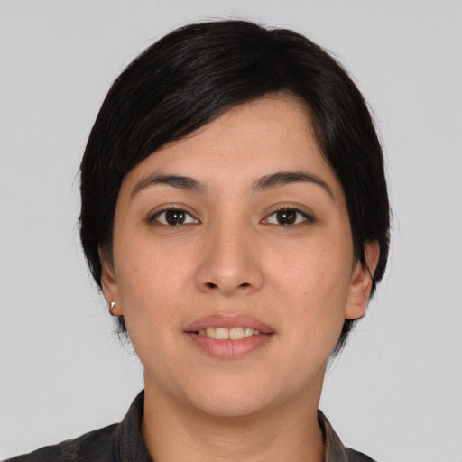 Joyful white young-adult female with medium  black hair and brown eyes