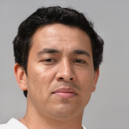 Neutral asian adult male with short  brown hair and brown eyes