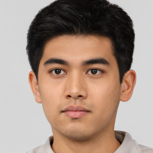 Neutral asian young-adult male with short  black hair and brown eyes