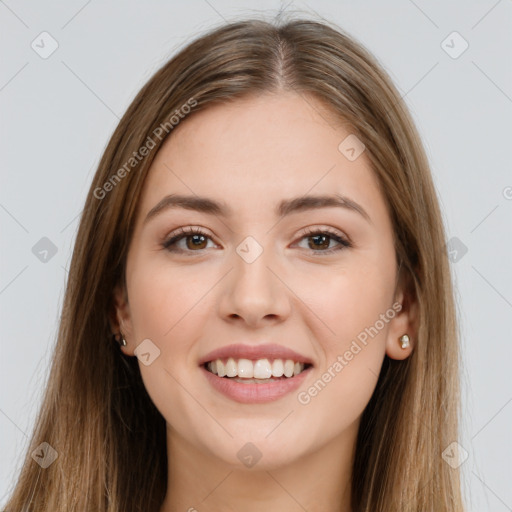 Joyful white young-adult female with long  brown hair and brown eyes