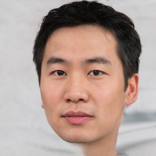 Neutral asian young-adult male with short  black hair and brown eyes