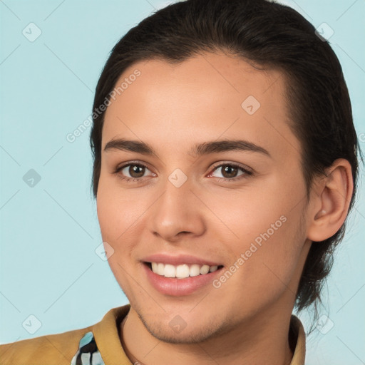 Joyful white young-adult female with short  brown hair and brown eyes