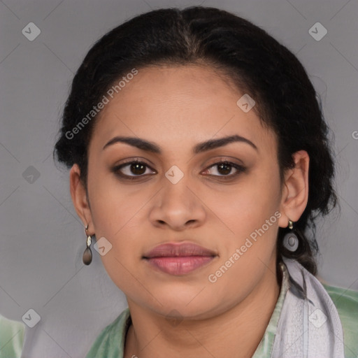 Joyful latino young-adult female with short  brown hair and brown eyes