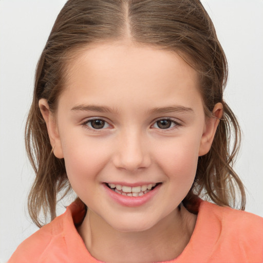 Joyful white child female with medium  brown hair and brown eyes