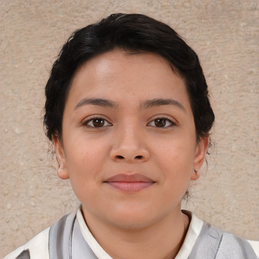 Neutral asian child female with short  brown hair and brown eyes