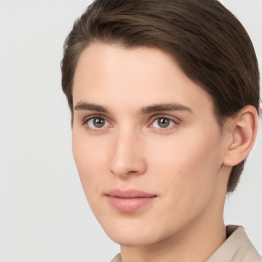 Neutral white young-adult female with short  brown hair and brown eyes