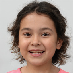 Joyful white child female with medium  brown hair and brown eyes