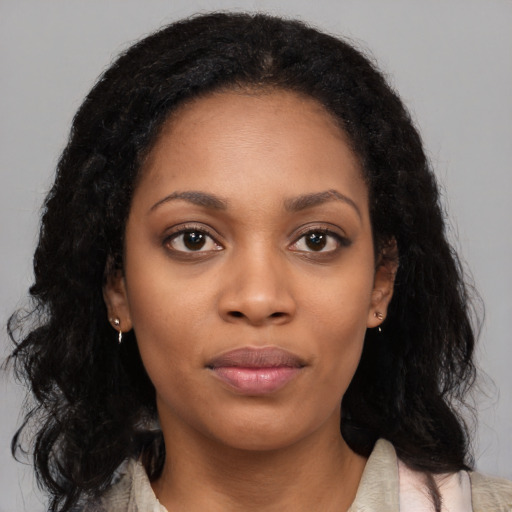 Neutral black young-adult female with long  black hair and brown eyes