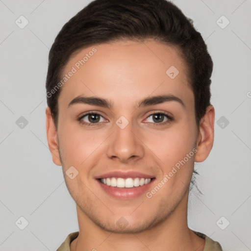 Joyful white young-adult female with short  brown hair and brown eyes