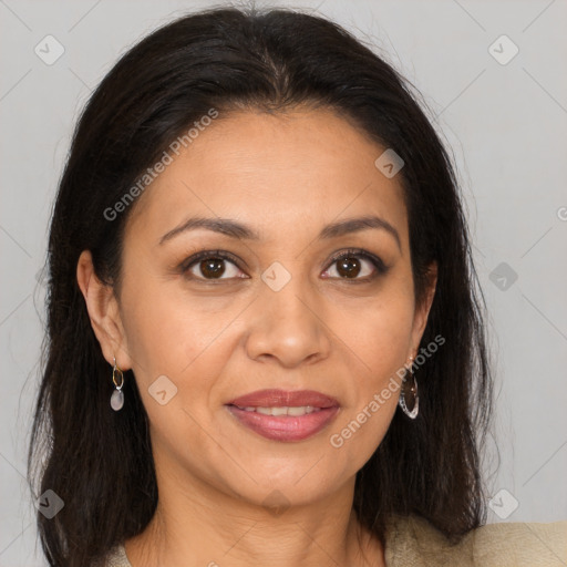 Joyful white adult female with long  brown hair and brown eyes