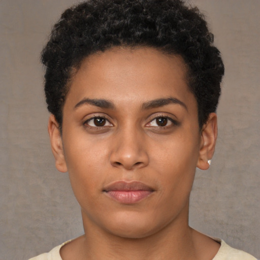 Neutral latino young-adult female with short  black hair and brown eyes