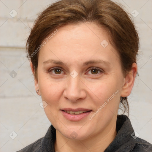 Joyful white adult female with short  brown hair and brown eyes