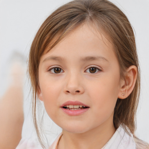 Joyful white child female with medium  brown hair and brown eyes