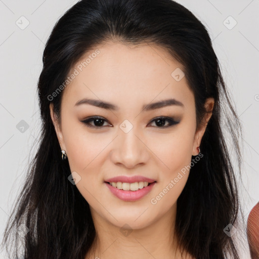 Joyful asian young-adult female with long  brown hair and brown eyes