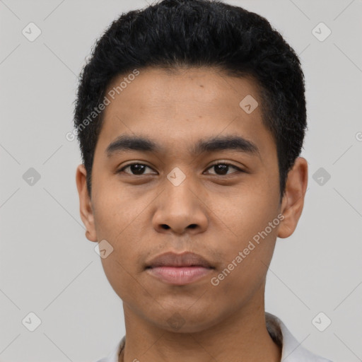 Neutral latino young-adult male with short  black hair and brown eyes