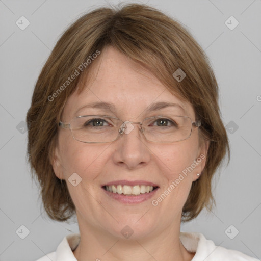 Joyful white adult female with medium  brown hair and blue eyes