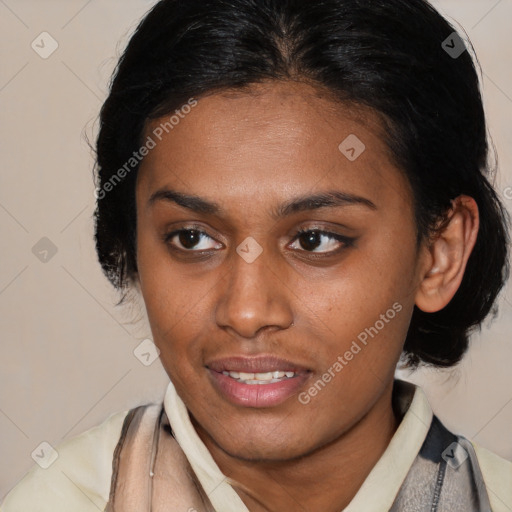 Joyful latino young-adult female with medium  brown hair and brown eyes