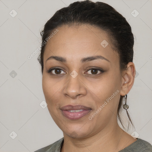 Joyful latino young-adult female with medium  brown hair and brown eyes