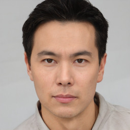 Neutral asian young-adult male with short  black hair and brown eyes