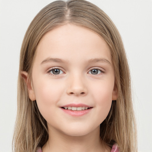 Joyful white child female with long  brown hair and grey eyes