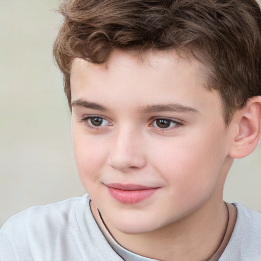 Joyful white child male with short  brown hair and brown eyes