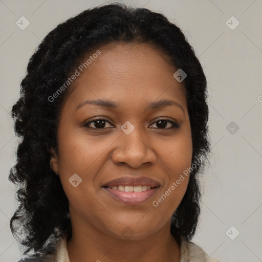 Joyful black young-adult female with long  brown hair and brown eyes