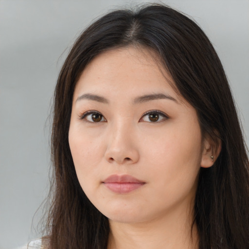 Neutral asian young-adult female with long  brown hair and brown eyes