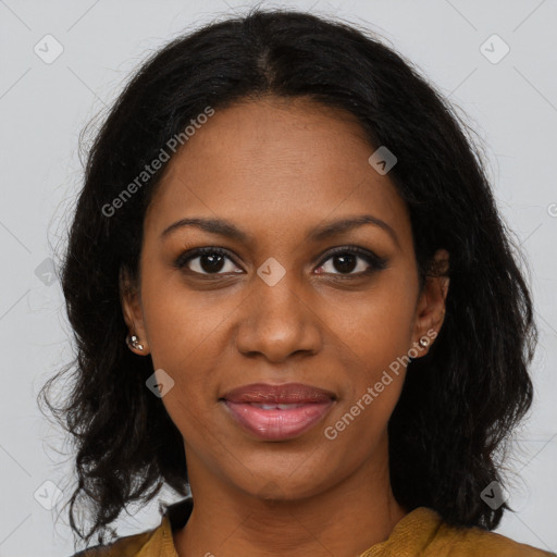 Joyful black young-adult female with long  brown hair and brown eyes