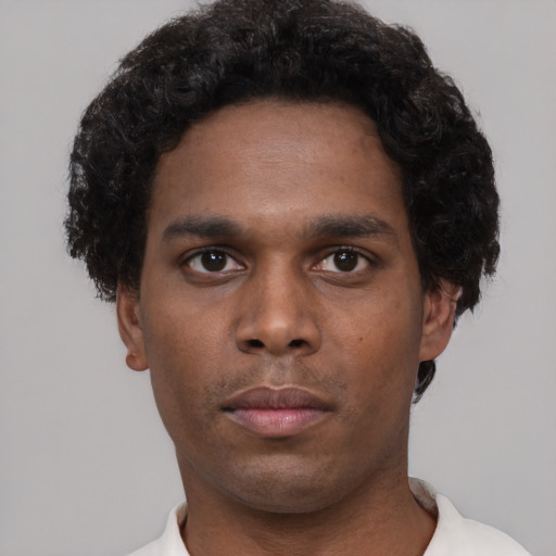 Neutral black young-adult male with short  brown hair and brown eyes