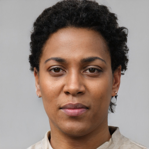 Neutral black young-adult female with short  black hair and brown eyes