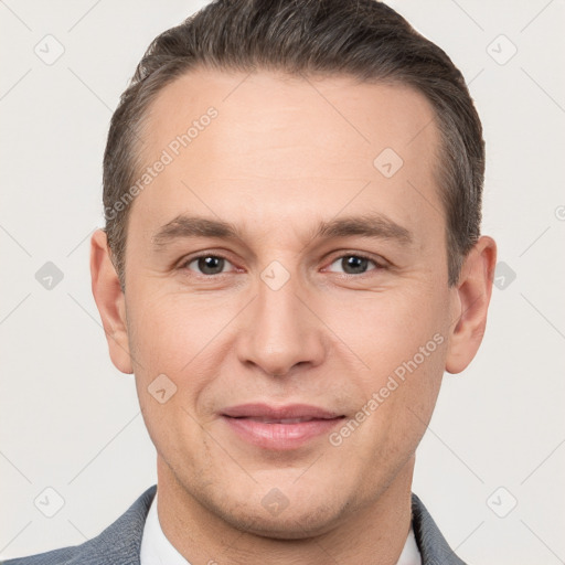 Joyful white adult male with short  brown hair and brown eyes