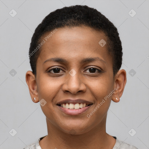 Joyful black young-adult female with short  brown hair and brown eyes