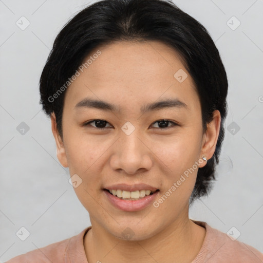 Joyful asian young-adult female with short  black hair and brown eyes