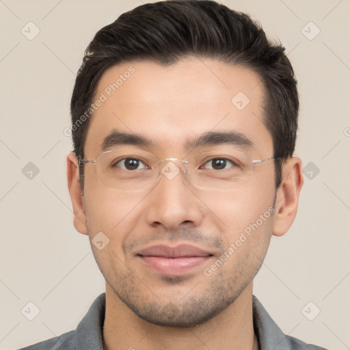 Joyful white young-adult male with short  black hair and brown eyes