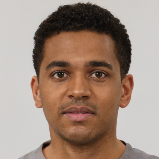 Neutral black young-adult male with short  brown hair and brown eyes