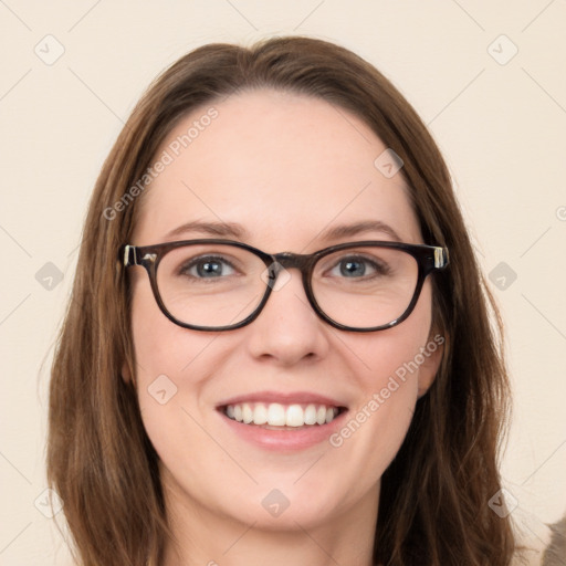 Joyful white young-adult female with long  brown hair and green eyes