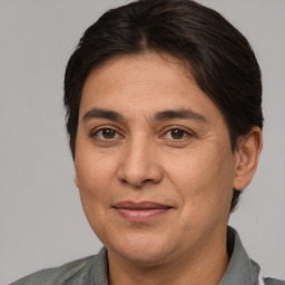 Joyful white adult male with medium  brown hair and brown eyes