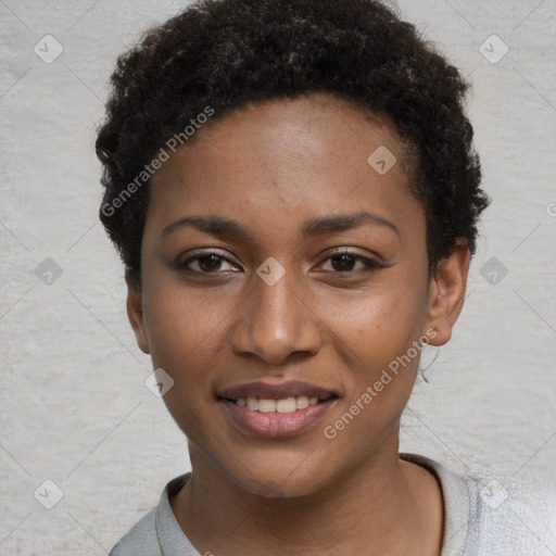 Joyful black young-adult female with short  brown hair and brown eyes