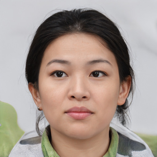 Neutral asian young-adult female with medium  brown hair and brown eyes