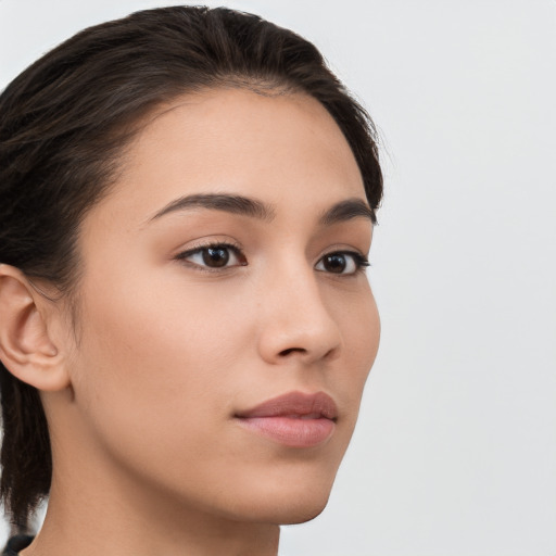 Neutral white young-adult female with medium  brown hair and brown eyes