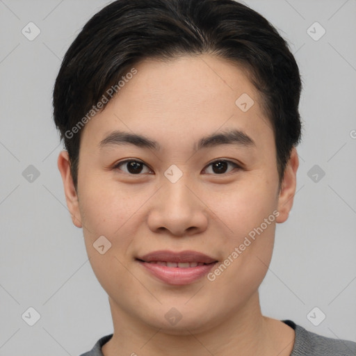 Joyful asian young-adult female with short  brown hair and brown eyes