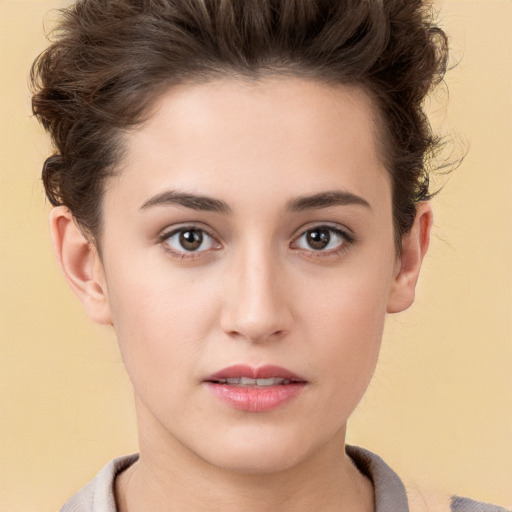 Neutral white young-adult female with short  brown hair and brown eyes