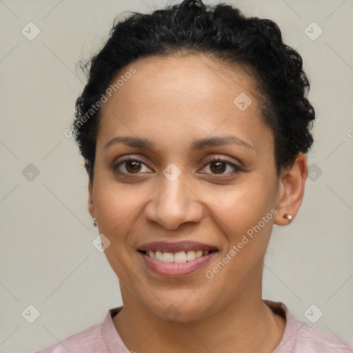 Joyful latino young-adult female with short  brown hair and brown eyes