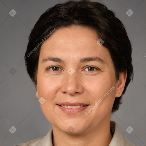 Joyful white adult female with short  brown hair and brown eyes